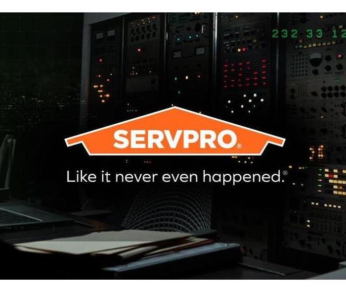 SERVPRO  orange logo with the words "Like it never even happened" below it. 