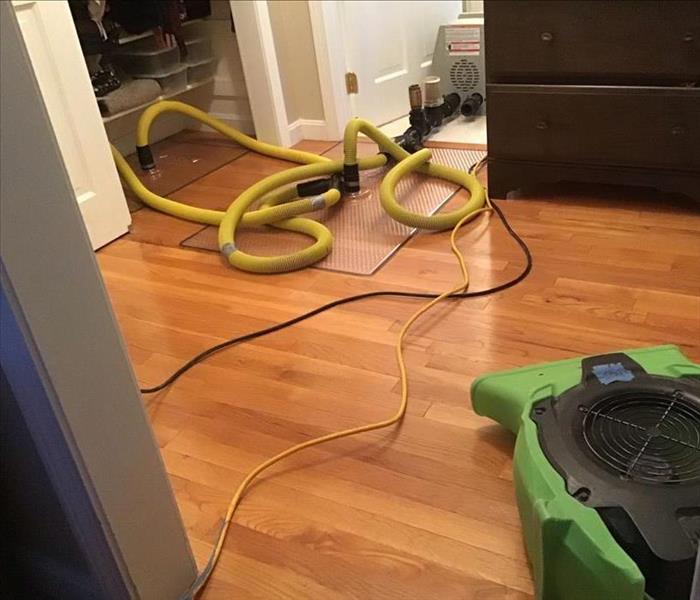 Floormats System Being Used On Drying Hardwood Floor In Manchester